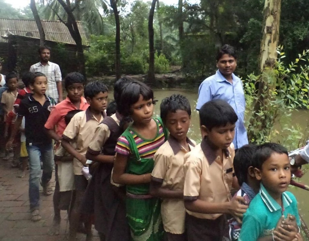 Grassroots Bridge Schooling Procession Along Village Paths