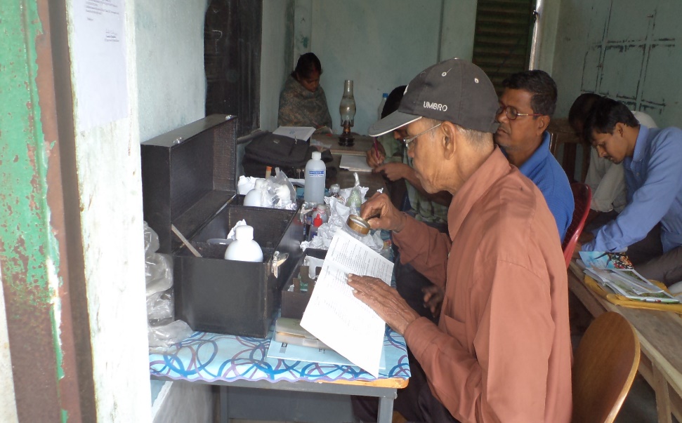 Agricultural scientist testing soil sample with diagnostic kit