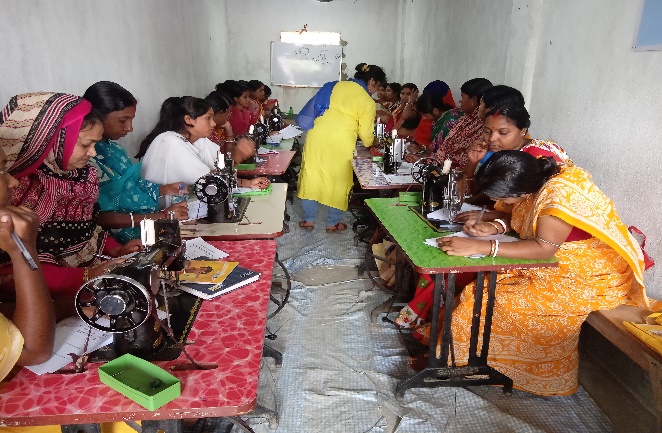Instructor demonstrating machine stitch technique