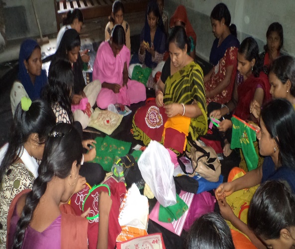 Women artisans in collective embroidery and needlecraft circle
